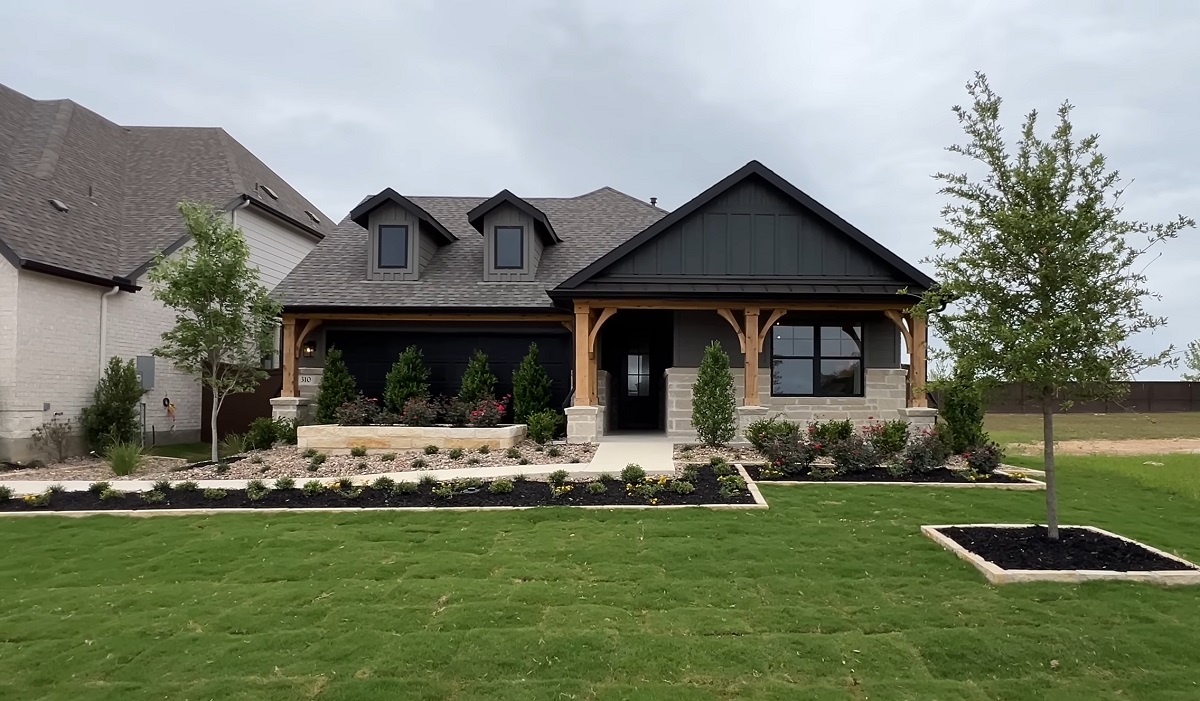 A beautiful modern home with a wide porch