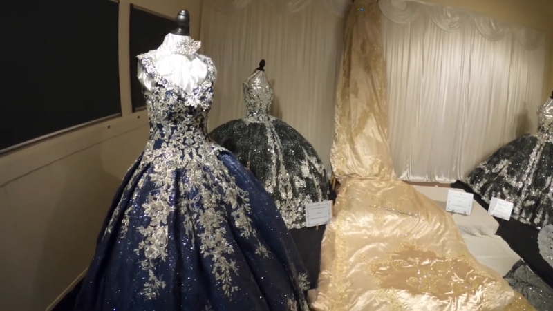 Display of ornate pageant gowns featured at the East Texas Yamboree in Gilmer, Texas
