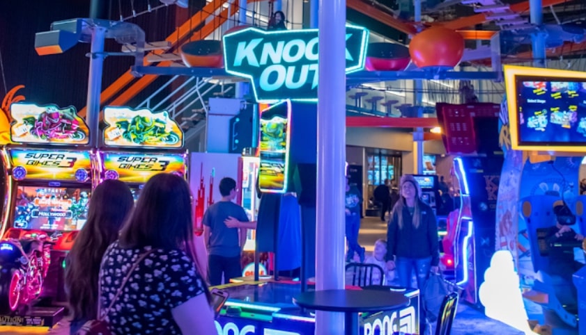 Neon-lit arcade games and interactive attractions at Hooky Entertainment