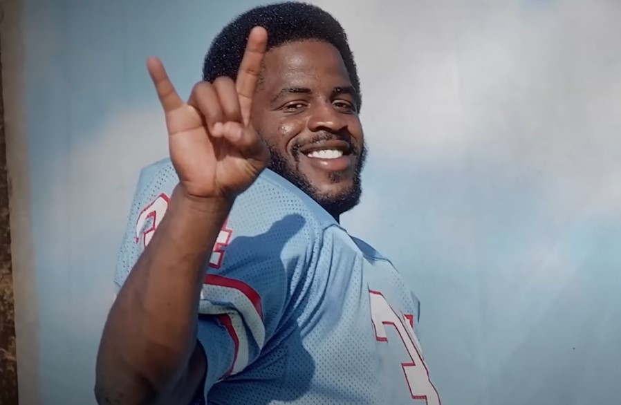 Earl Campbell posing for a picture