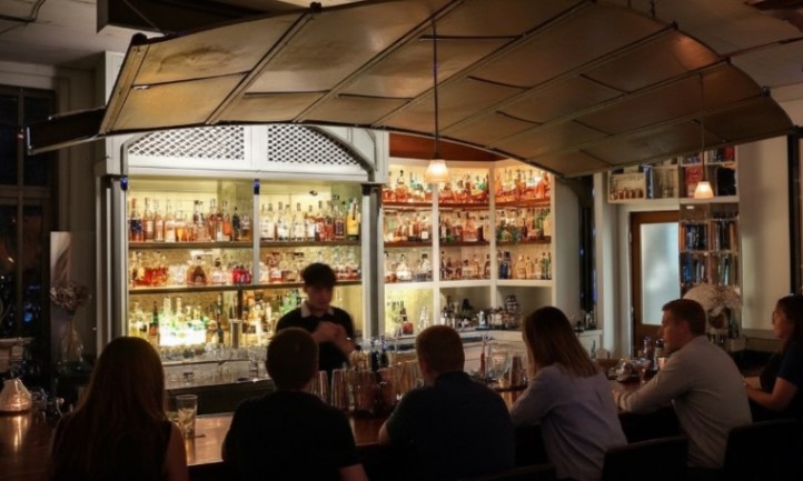 A group of people socializing at a Julep bar