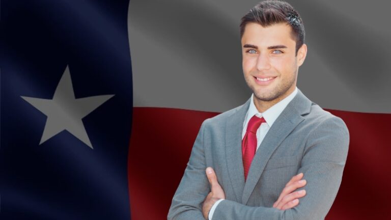 Confident man in a suit stands before the Texas flag, symbolizing business in Texas