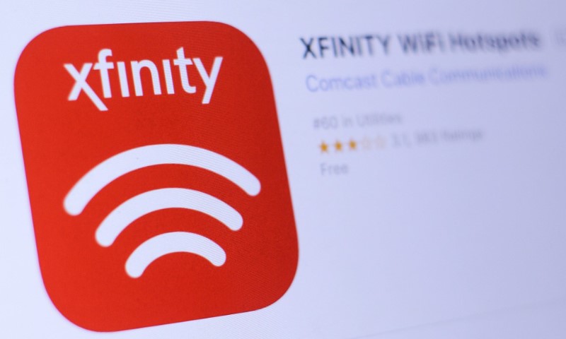 Red Xfinity app icon with a white WiFi symbol displayed on a screen